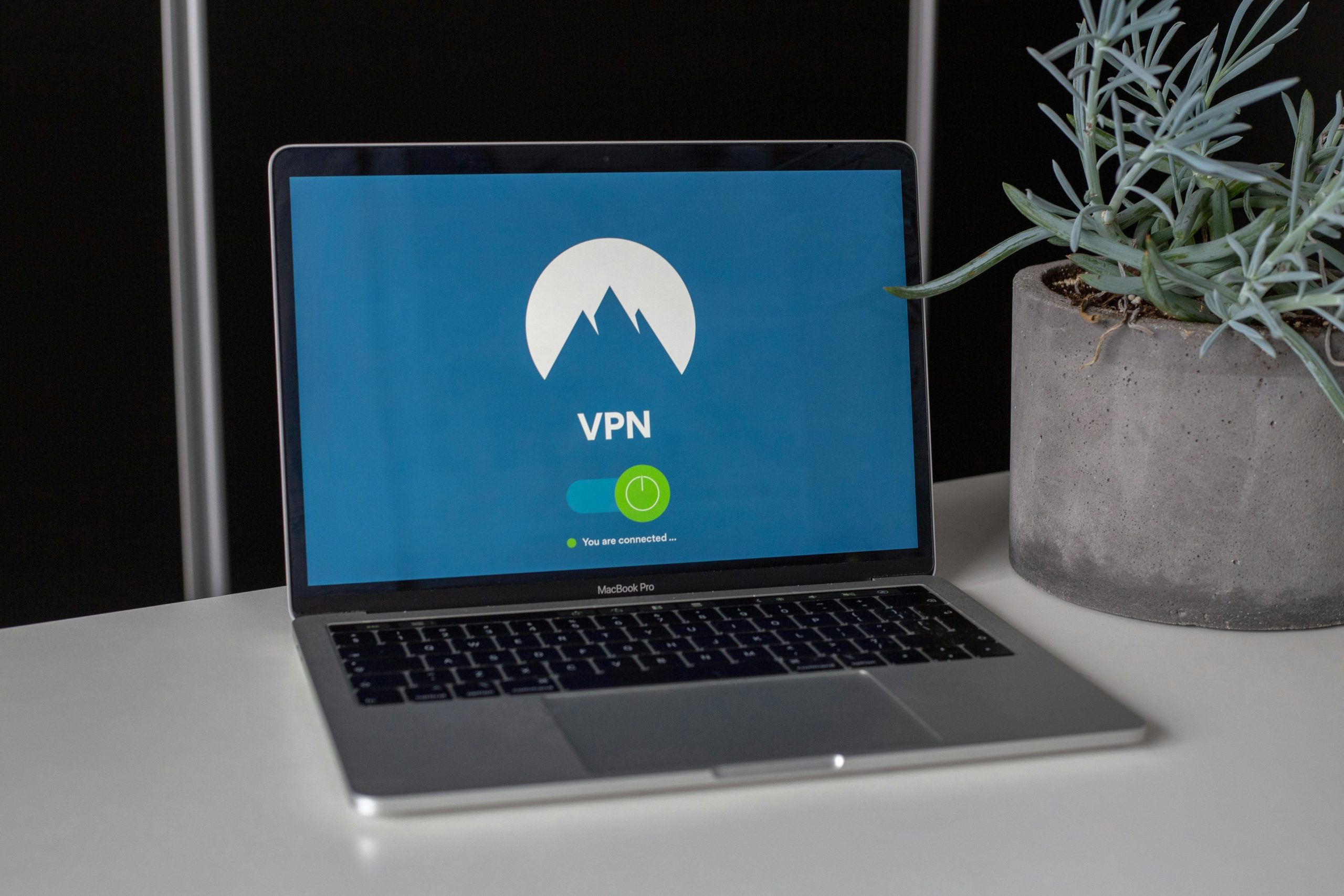 Photo of a laptop showing a VPN connection screen